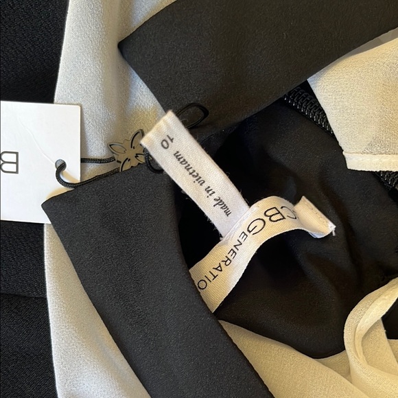 BCBGeneration Cream Long Sleeve black jumpsuit NWT - Picture 8 of 12